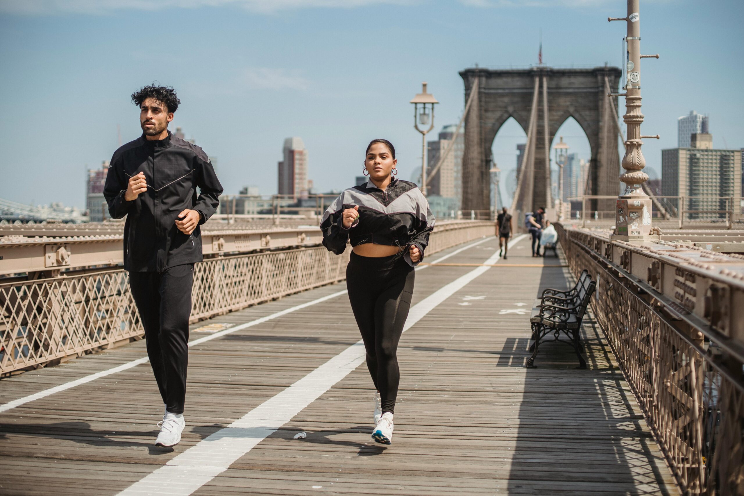 couple running together at morning time in a city