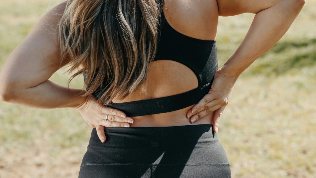 A women suffering with back Injury