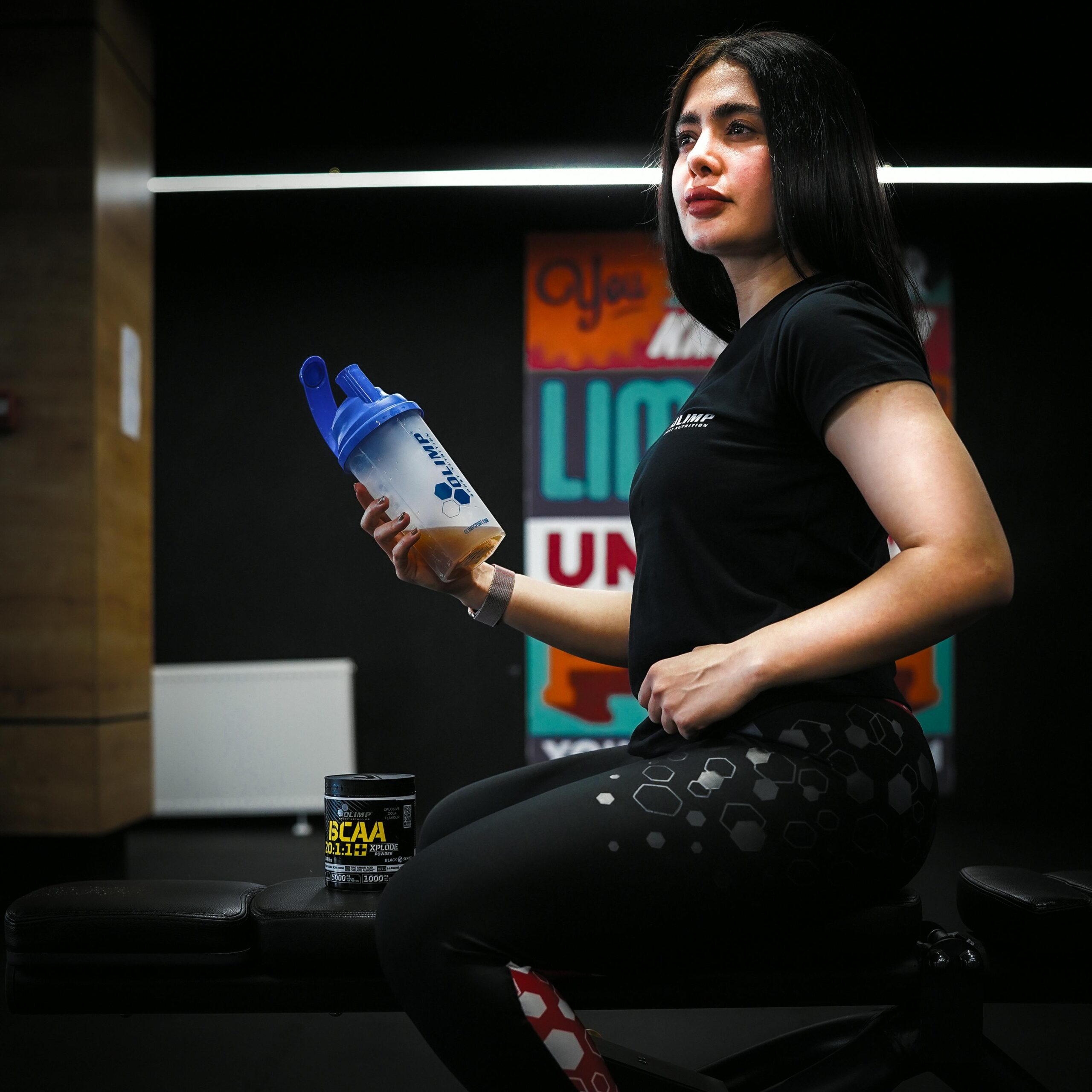 A woman drinking whey protein